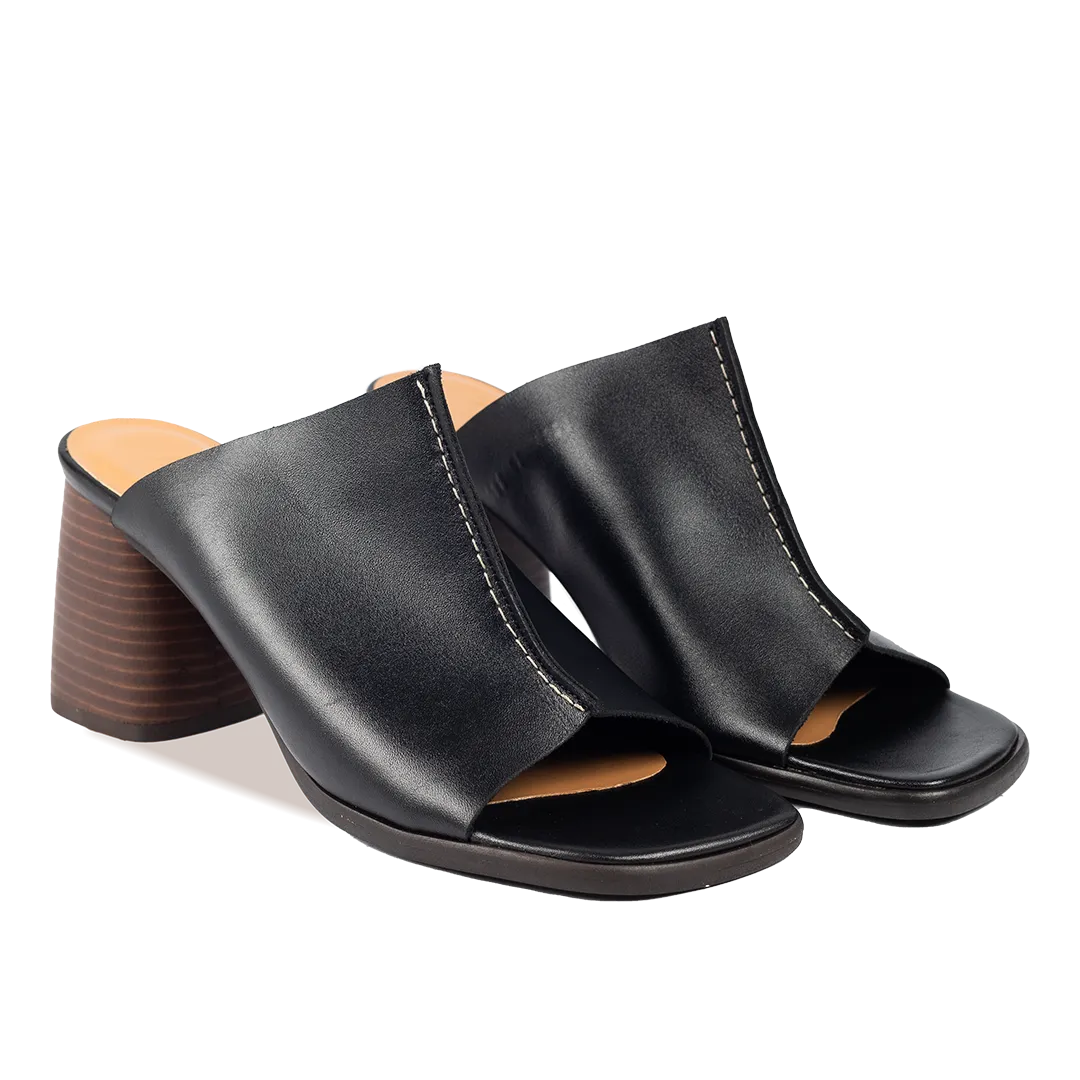 Mule with sculptural heel